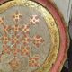 Pink and golden Florentine round top