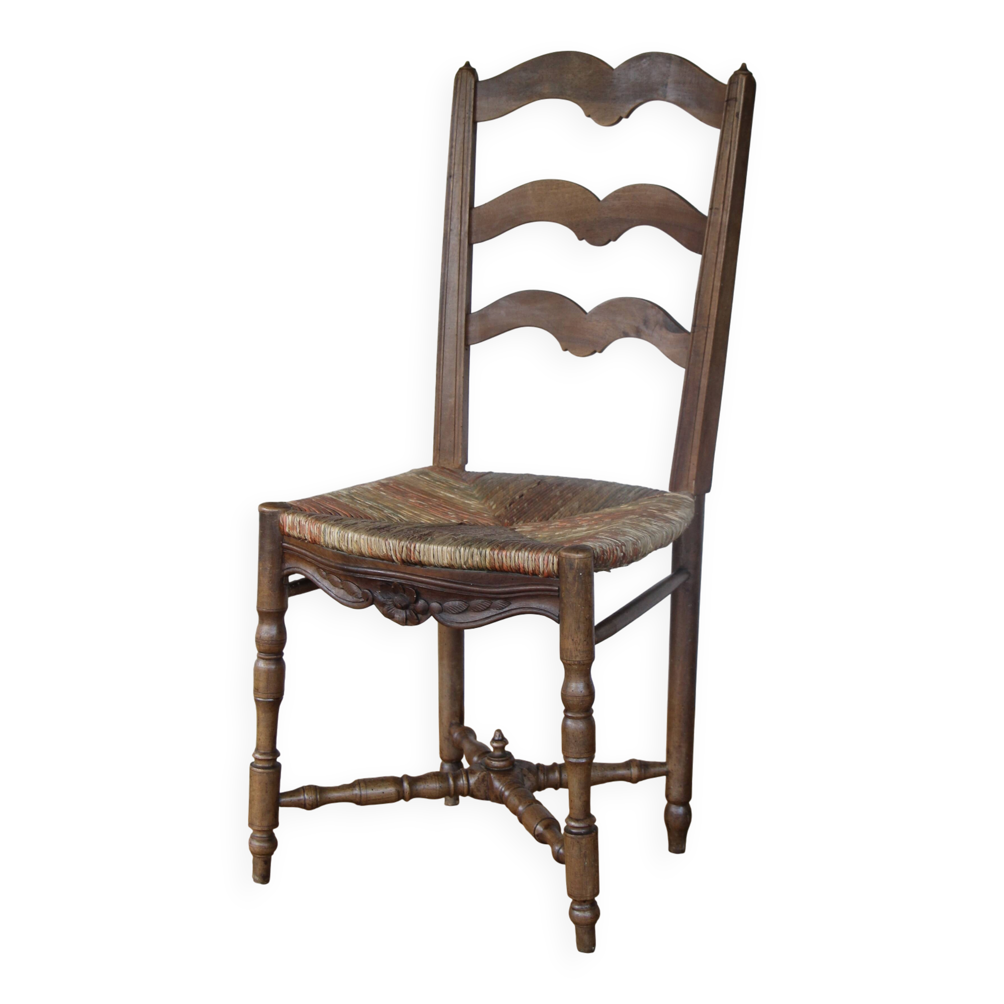 Antique chair with coloured rush seating.