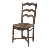 Antique chair with coloured rush seating.