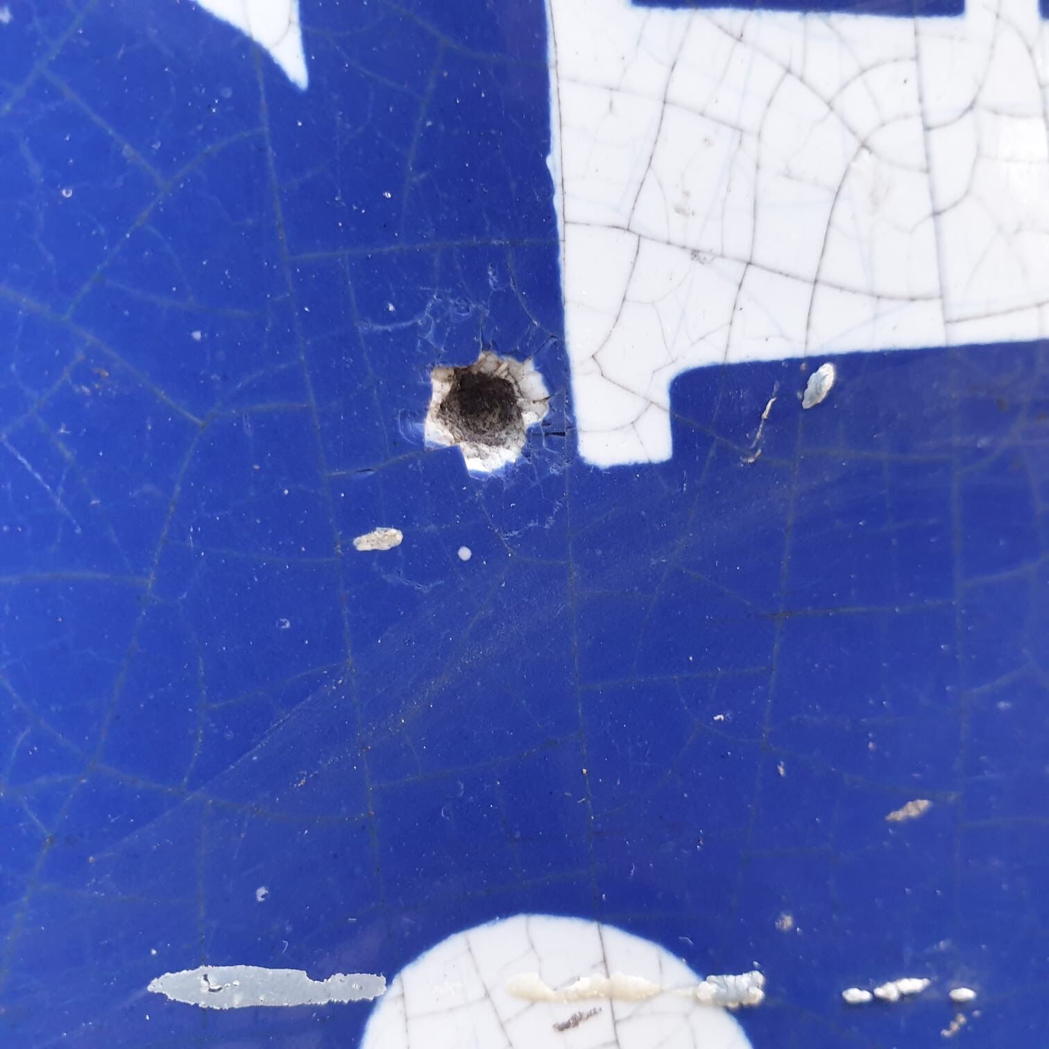 old enamelled street plaque