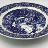 Blue enamelled earthenware wall dish with peasant scene decor Boch La Louvière