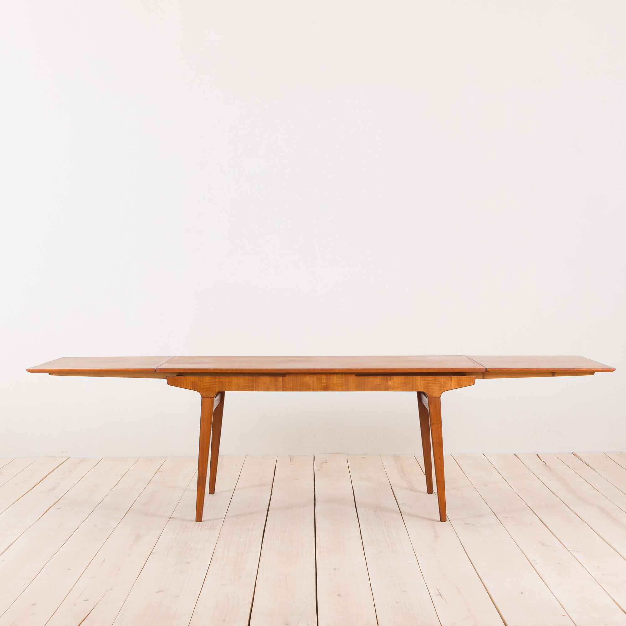 Teak extension dining table with concealed panels, Denmark, 60s