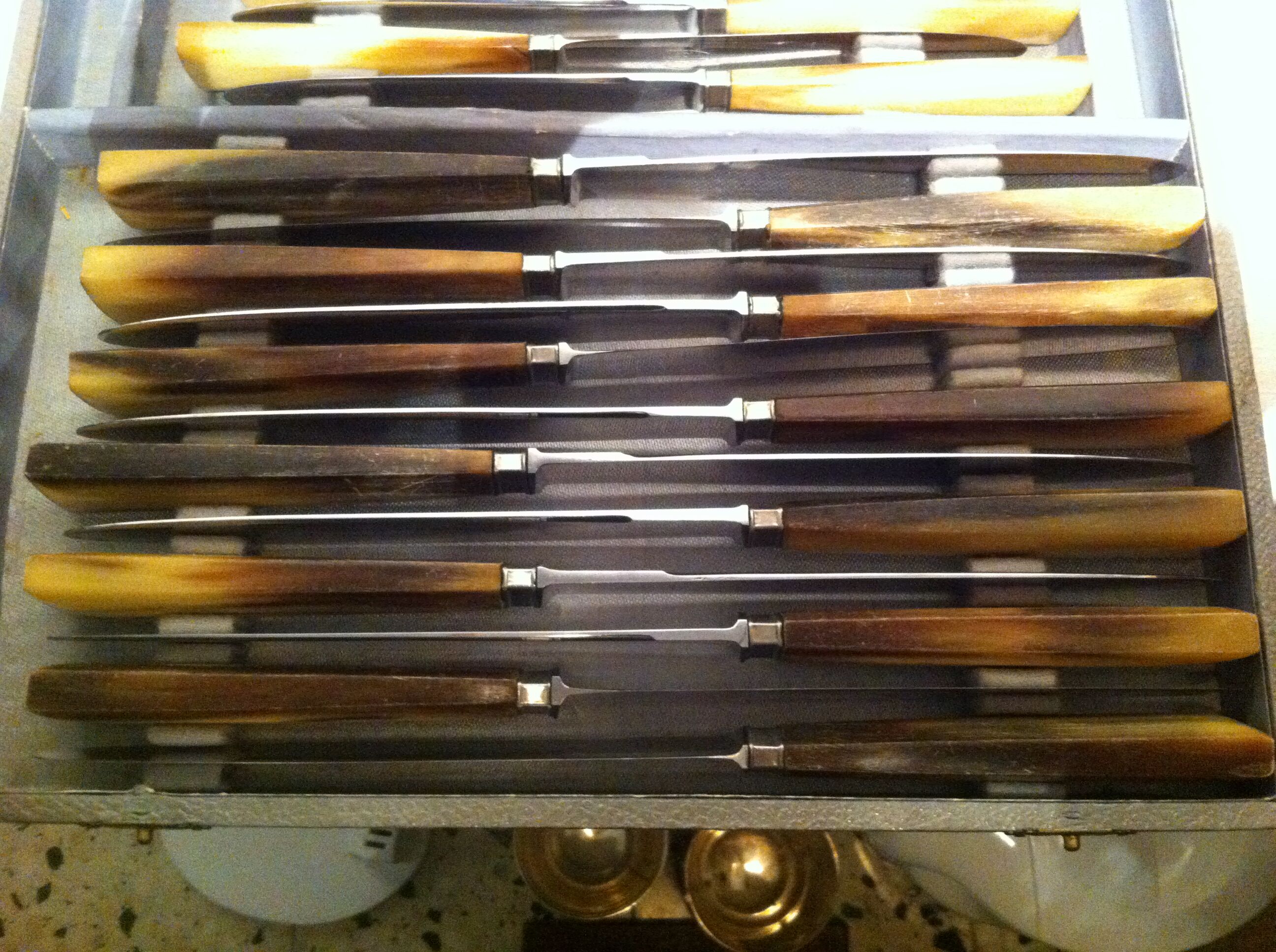 Ancient knives, sleeve horned inox blades