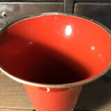 Cut vase on foot in red and black metal