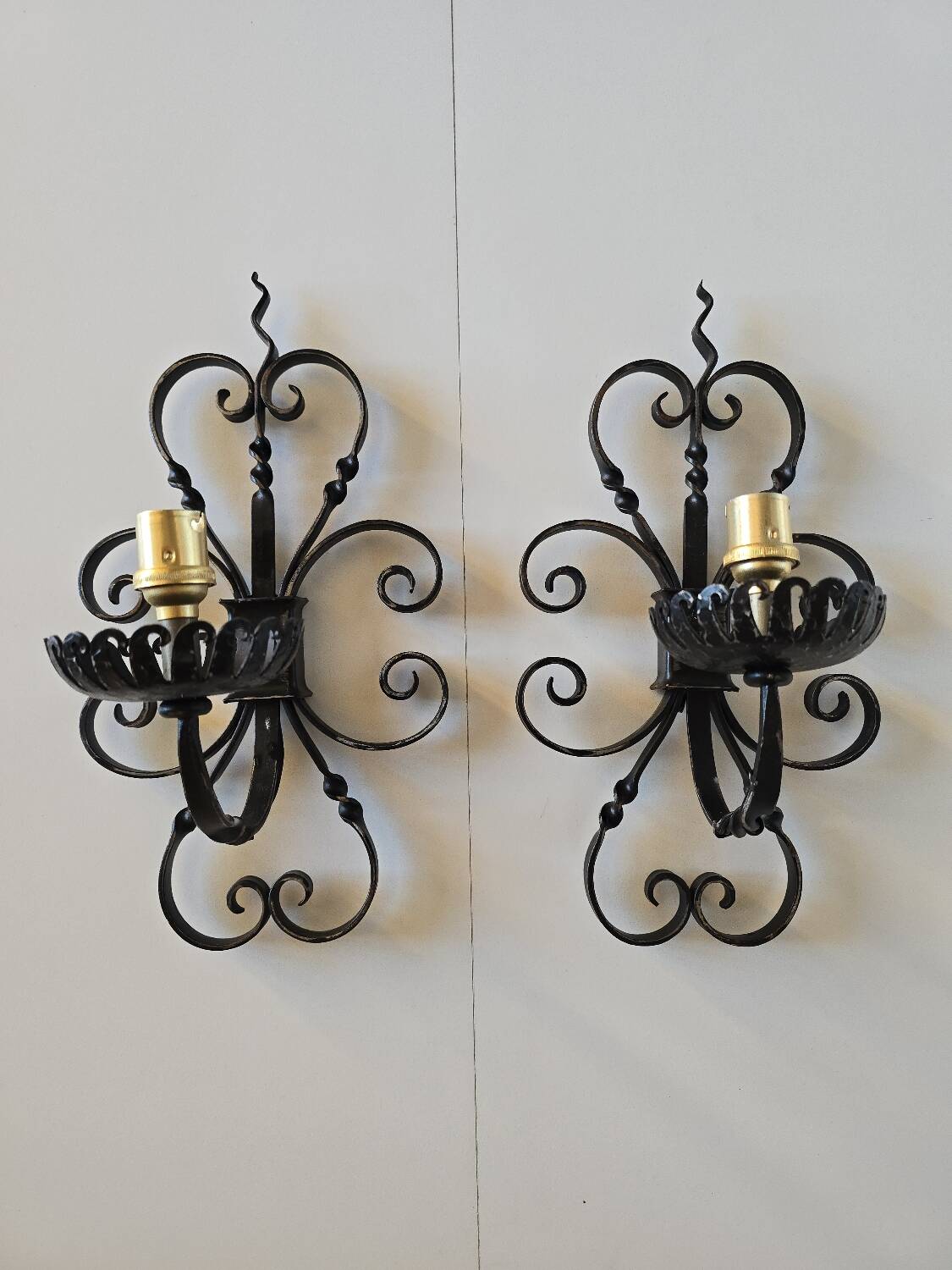 Pair of wrought iron wall sconces