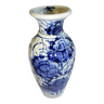 Old Chinese ceramic vase decorated with white blue flowers