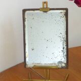 Table mirror on a brass easel