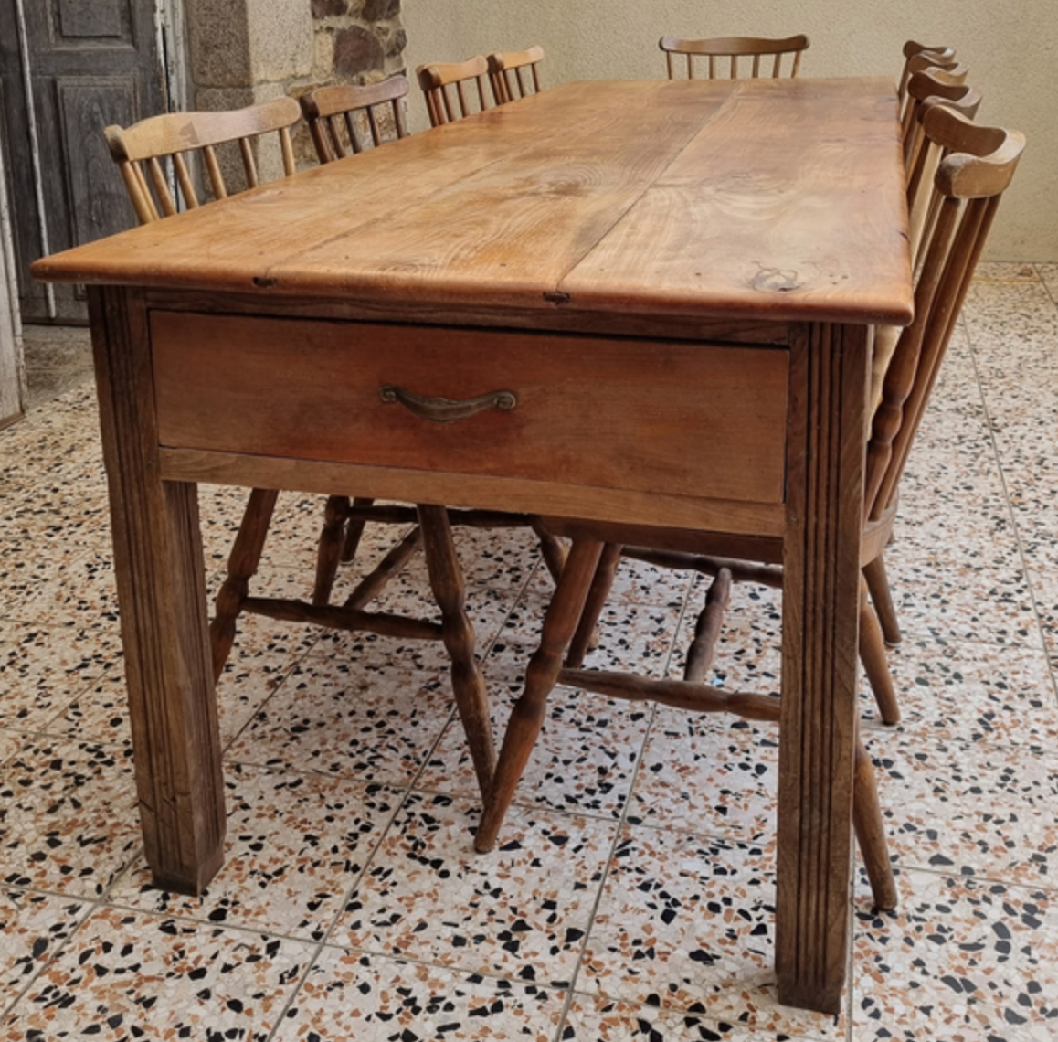 Solid oak farmhouse table, a drawer, vintage, early twentieth century.