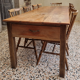Solid oak farmhouse table, a drawer, vintage, early twentieth century.