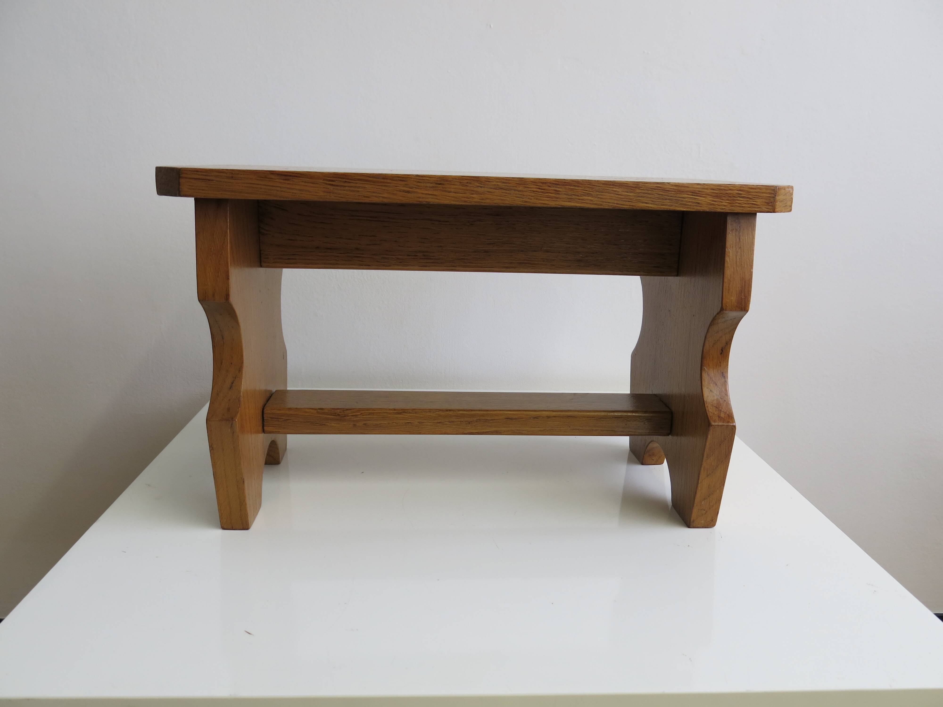 Small wooden footrest stool