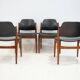 Set of four Arne Vodder chairs in hardwood and black leather.