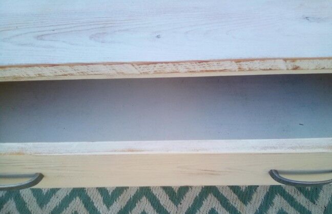 White patina low wooden commodity