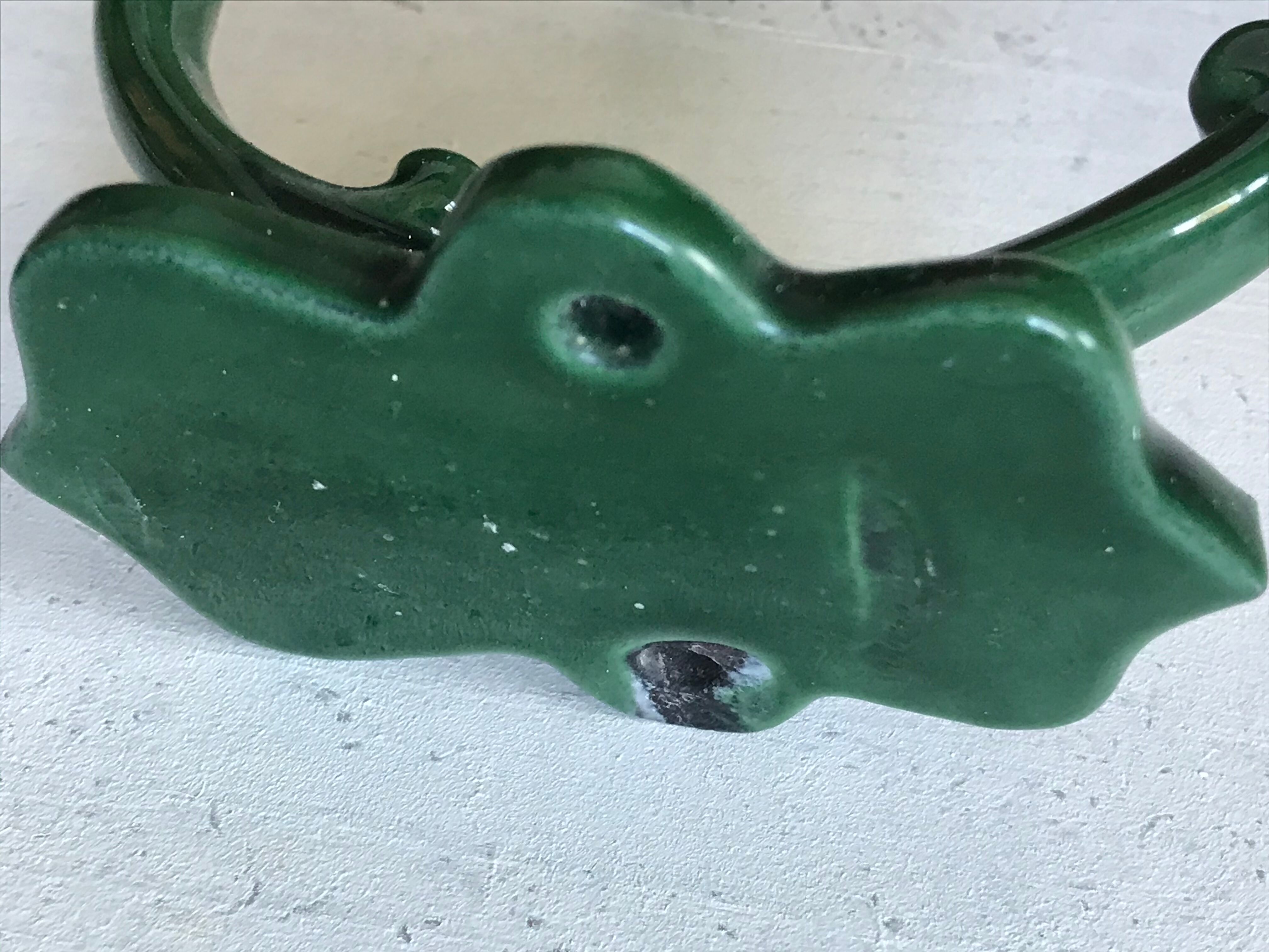 Pair of enamelled cast iron pads