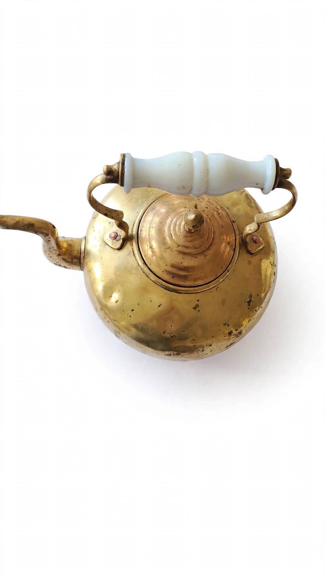 Victorian tripod kettle made of brass with a porcelain handle.