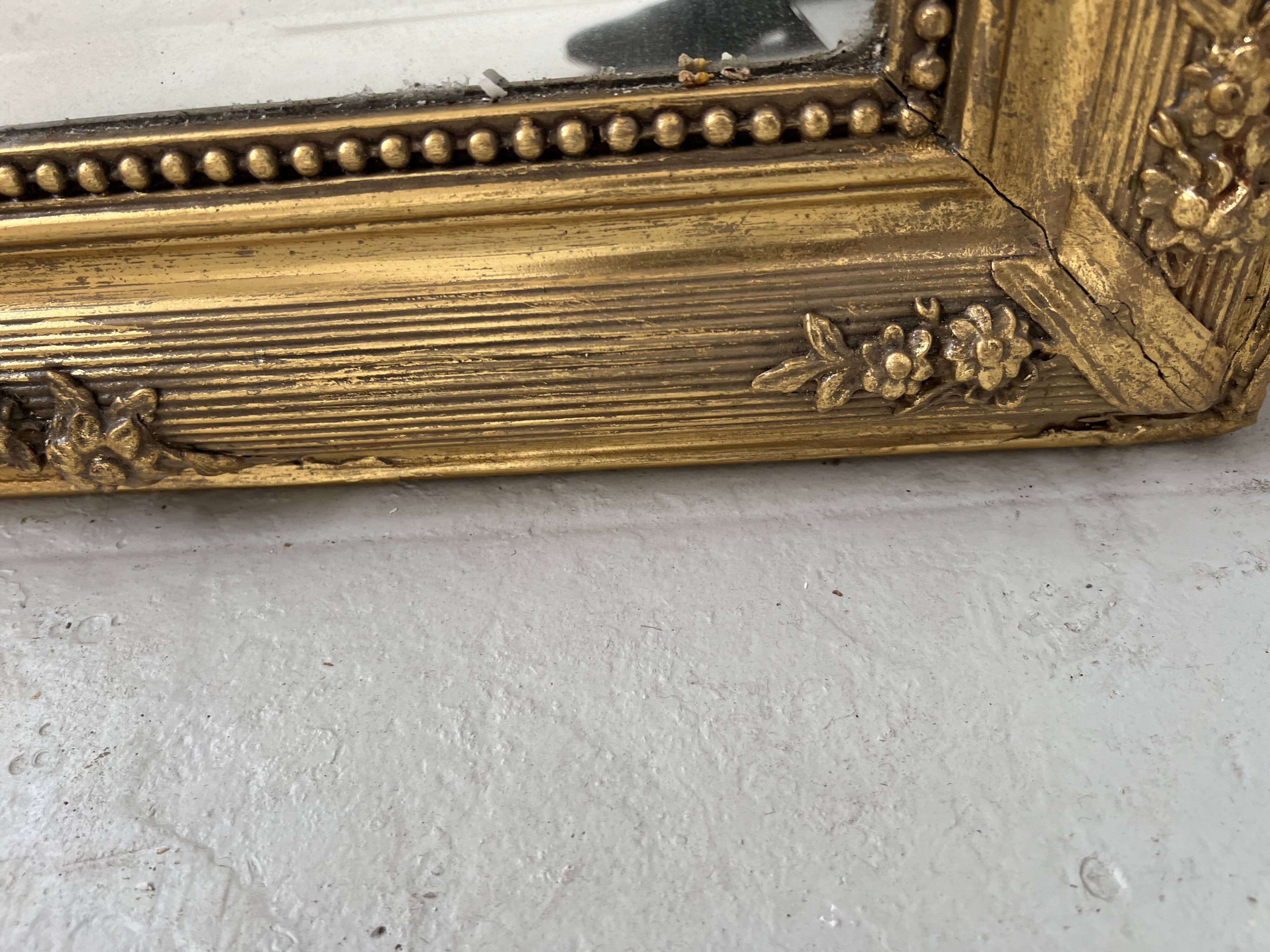 Louis XVI style mirror in wood and gilded stucco, 19th century