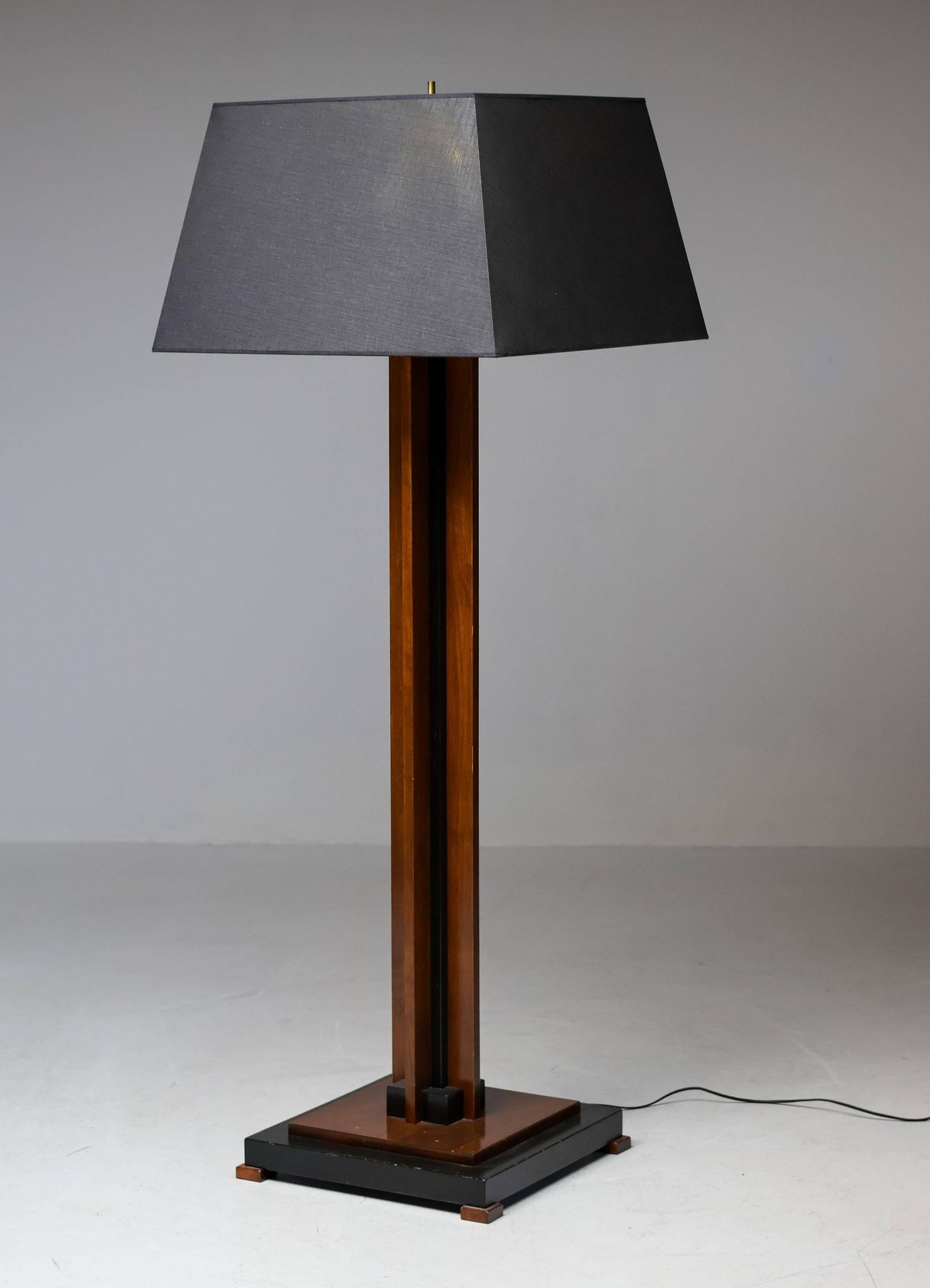 Amsterdam School floor lamp in partially ebonised cherry with a black linen shade.