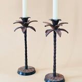 Pair of patinated metal candlesticks