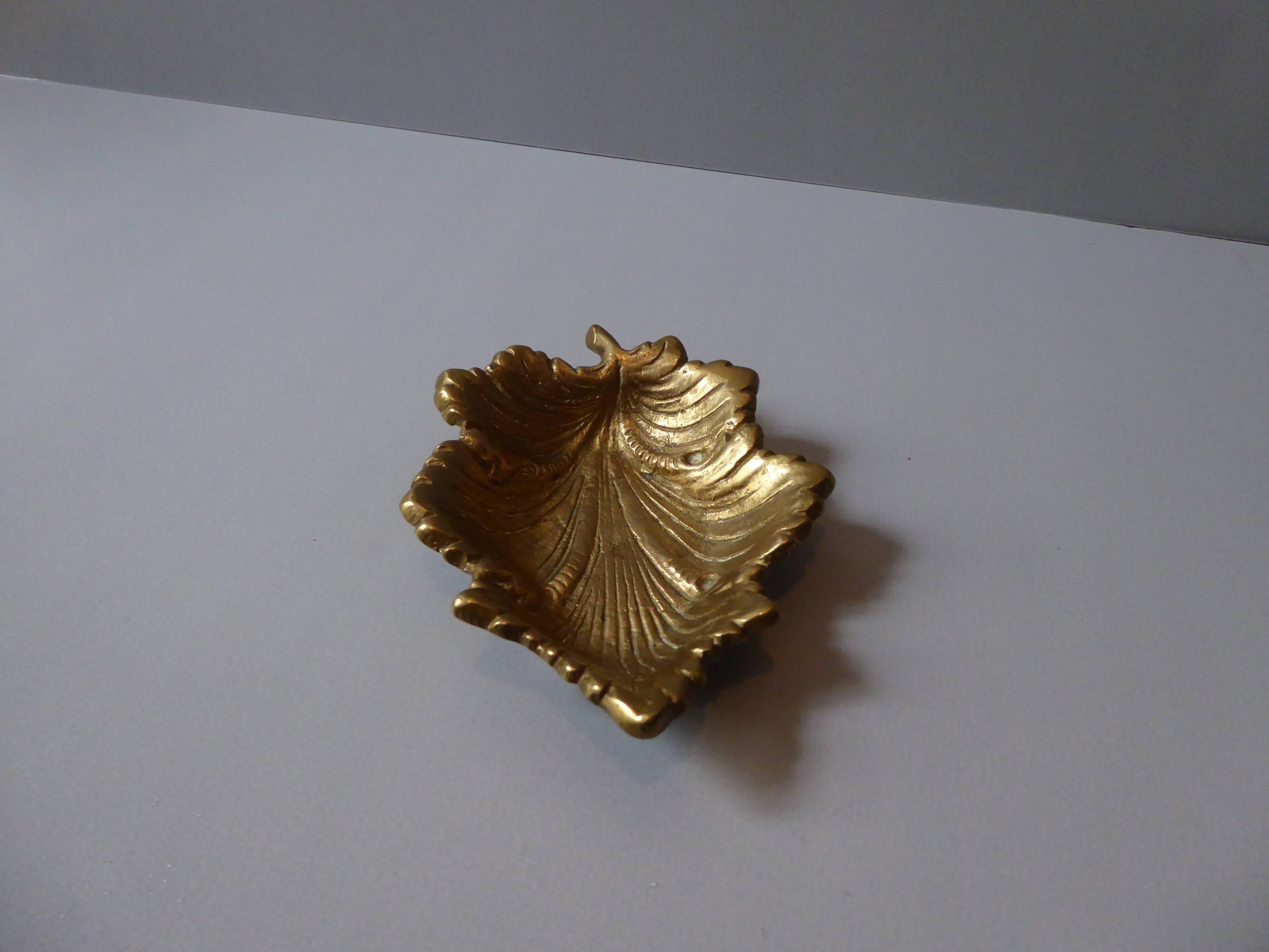 Empty gilded bronze pocket