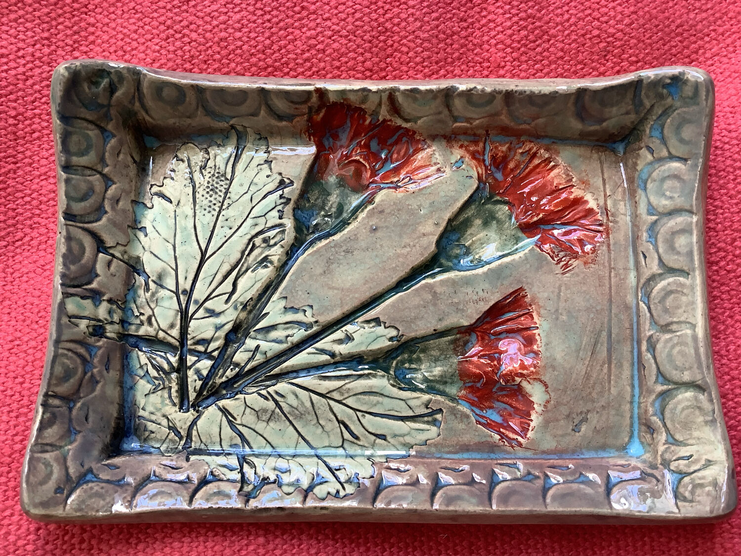 Arty enameled terracotta dish signed by the artist