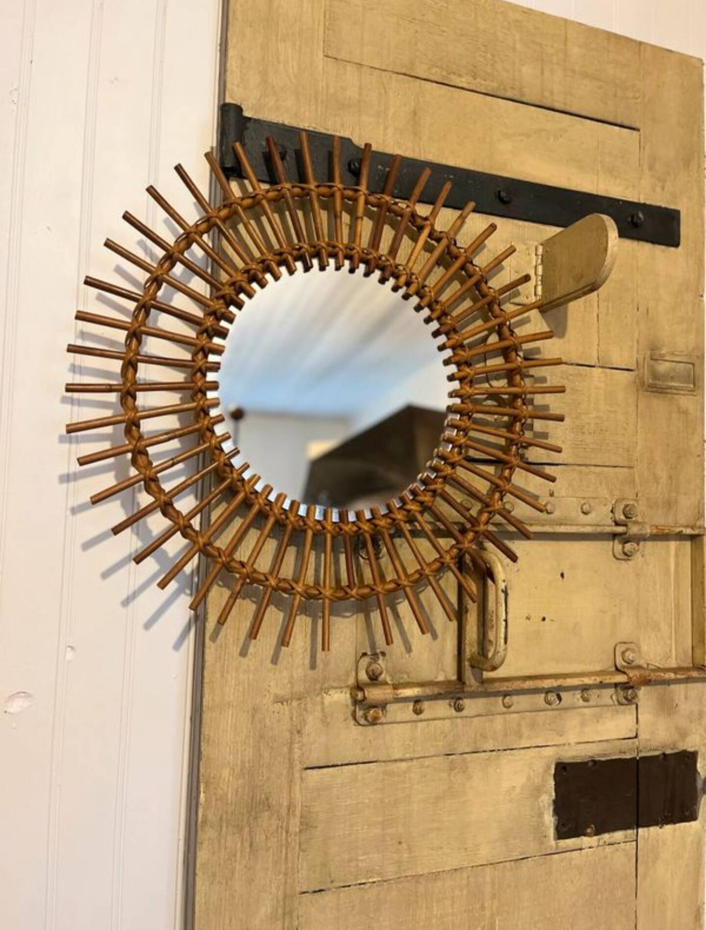 Round rattan mirror