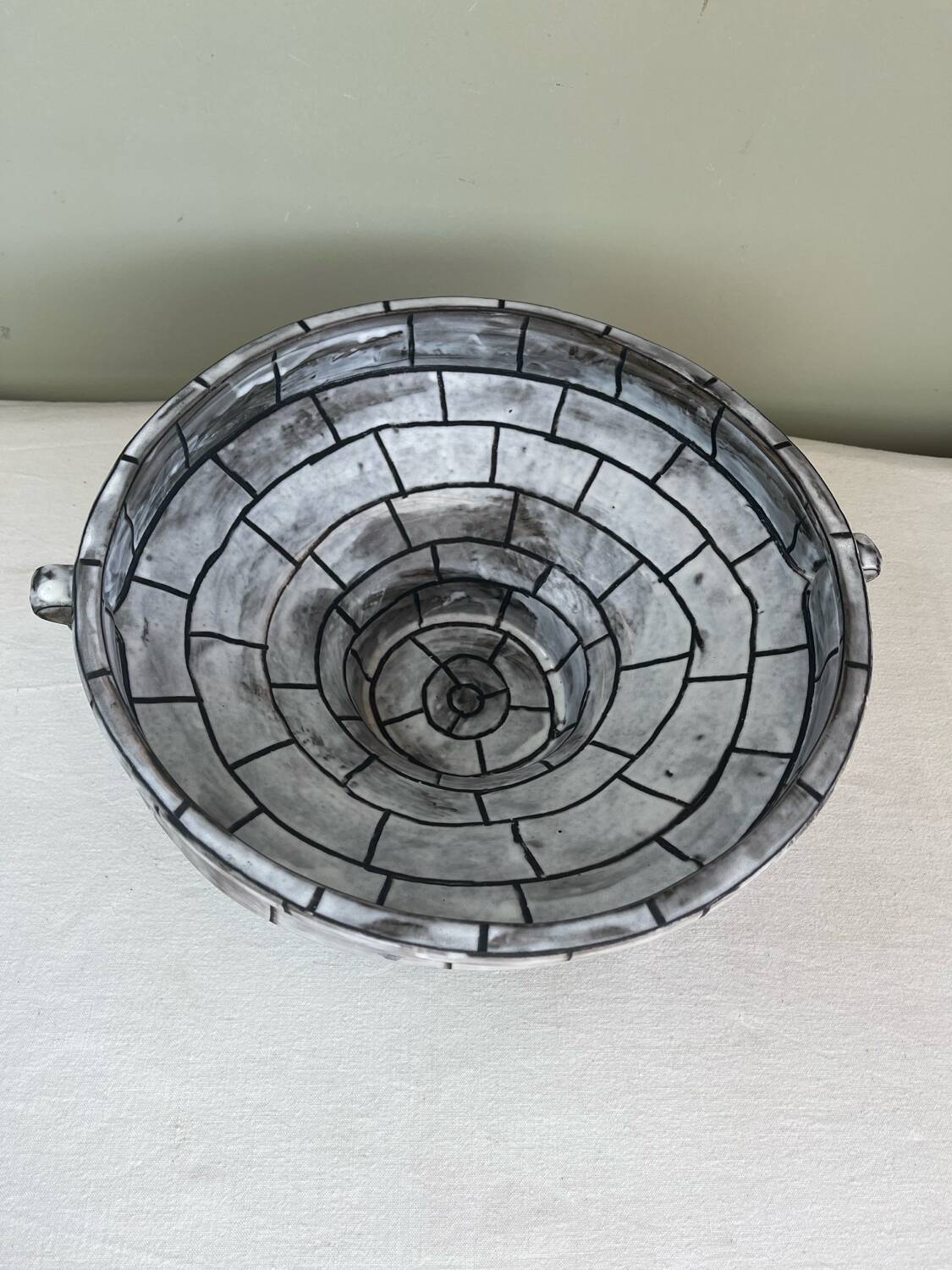 Handcrafted glazed ceramic architectural cup