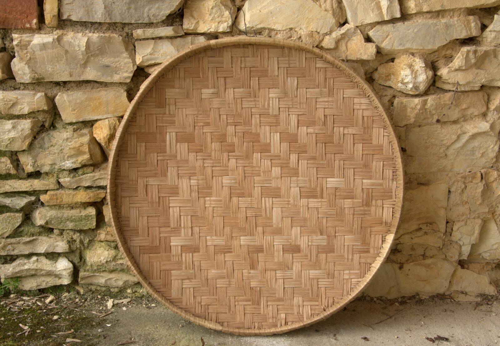 Large rice plate made of wicker, originating from Cambodia, 66cm.