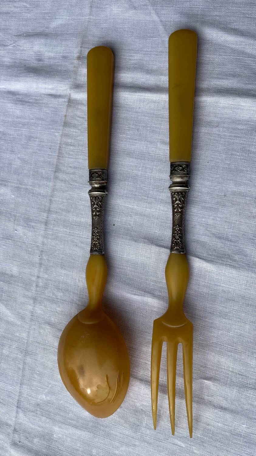 Old salad service in horn and silver metal