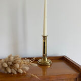 Old brass push candle holder