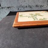 Vintage ceramic trivet – stylised floral design