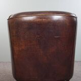 Dark sheep leather club armchair, sleek design