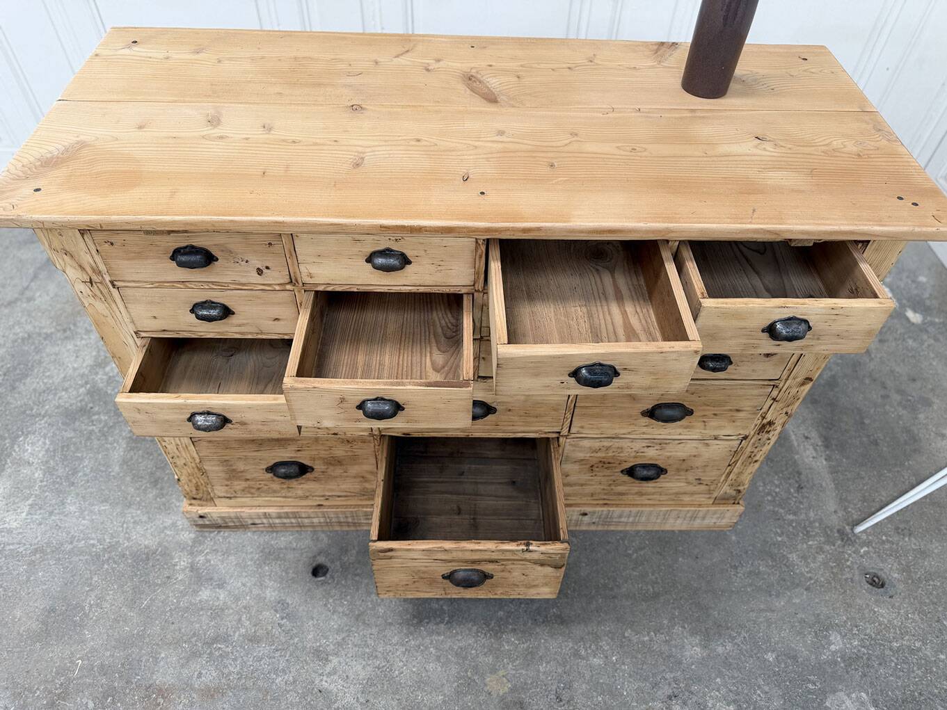 Trade cabinet with 18 drawers from 1900