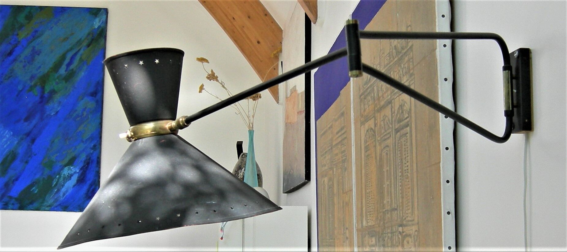 Roger Mathieu's diabolo sconce for Lunel with double lighting