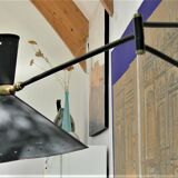 Roger Mathieu's diabolo sconce for Lunel with double lighting