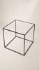Designer coffee table in metal and glass