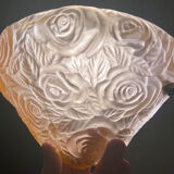 Art Deco wall lamp (1930) with rose patterns in molded pressed glass