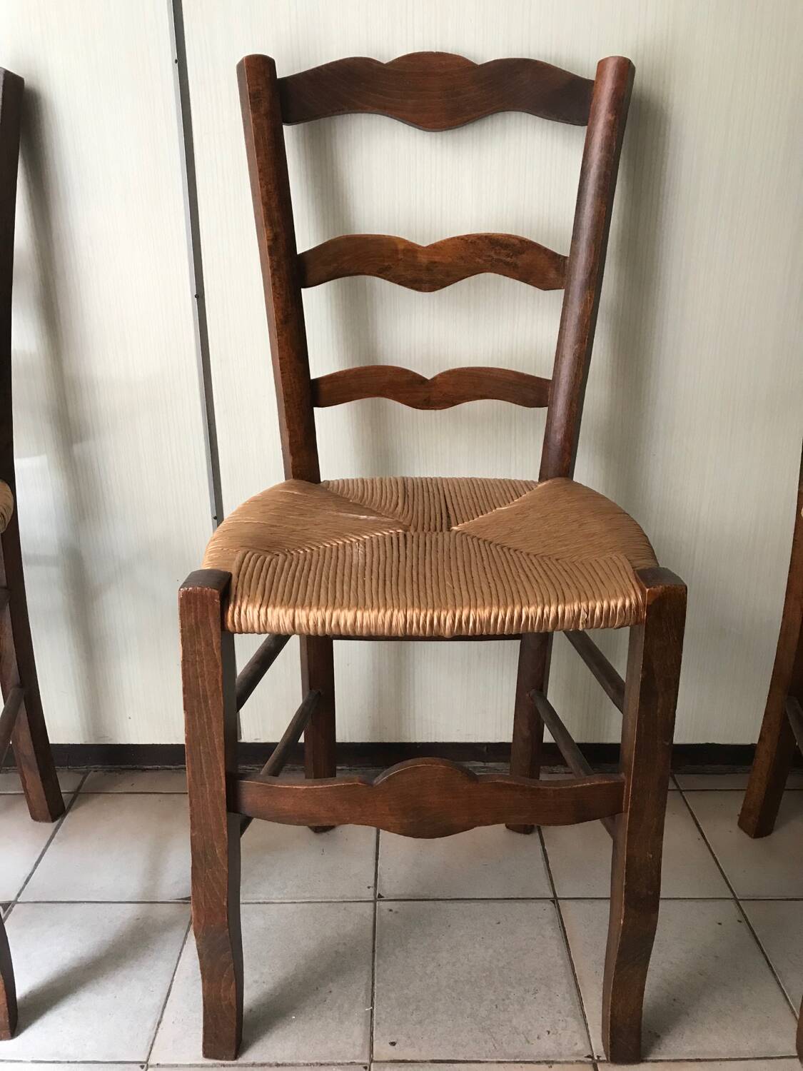 Wooden and straw chairs