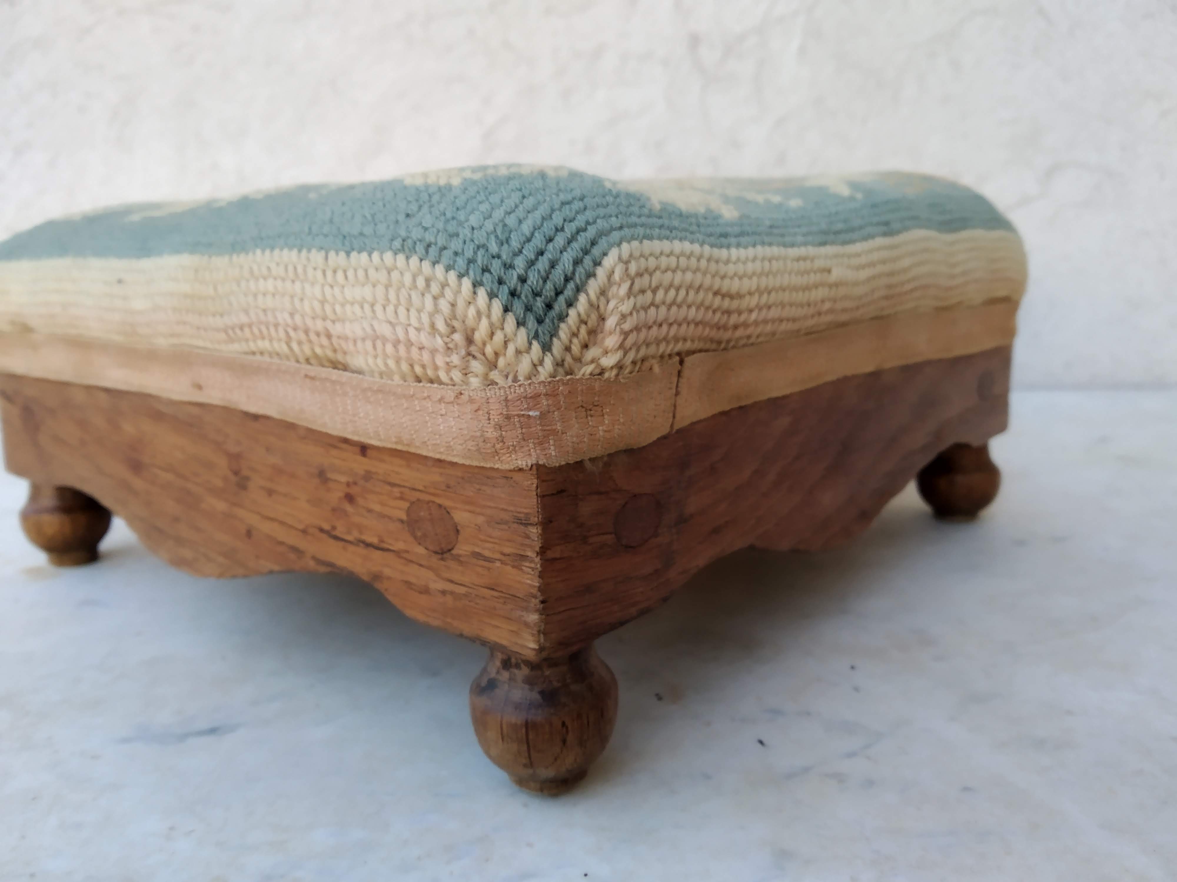 Small antique footrest stool lined canvas