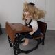 Wooden swing desk and porcelain dolls