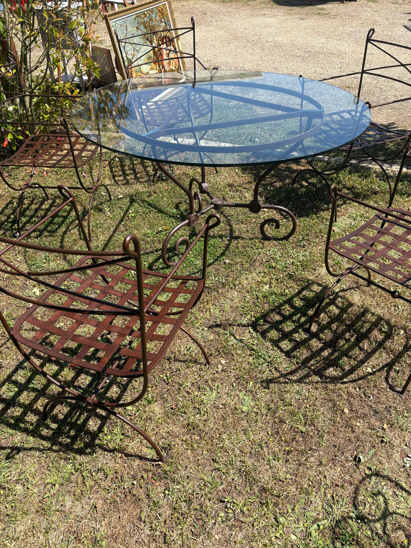 Wrought iron table and chairs for indoor/outdoor use.