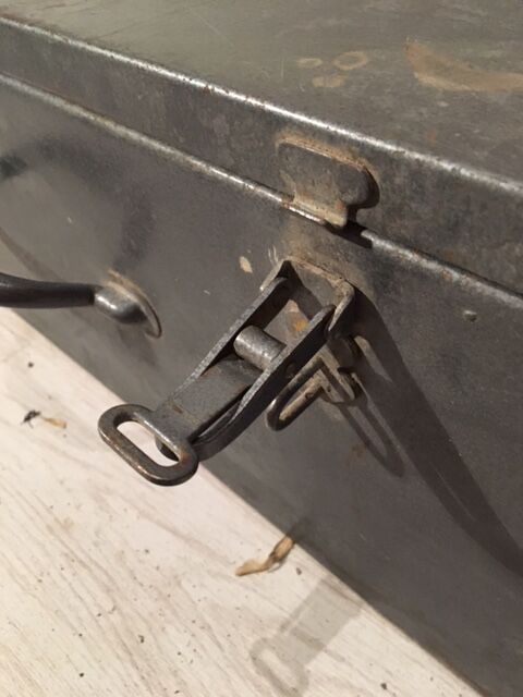 A crate, box or metal suitcase in undue style 60/70