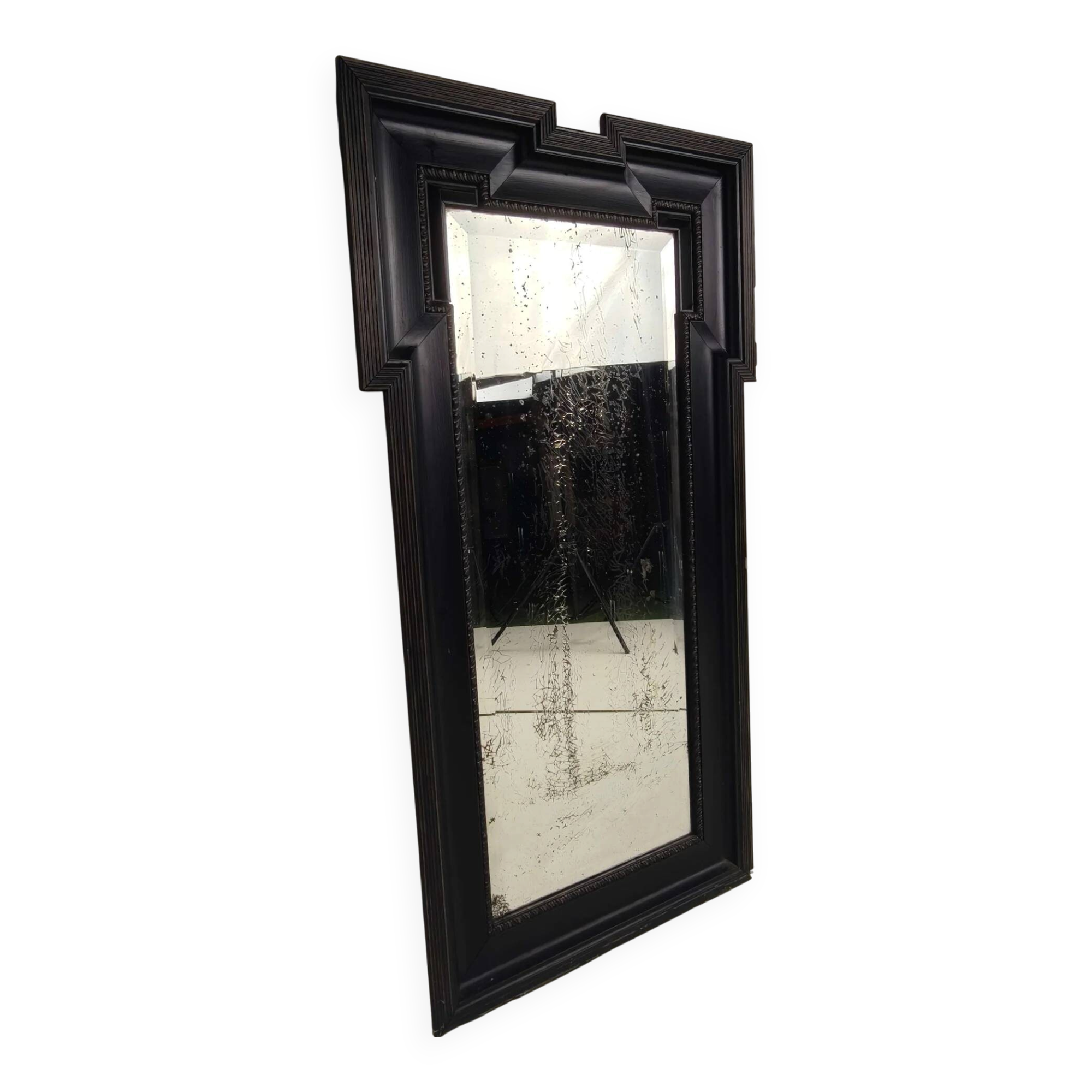 Late 19th century ebonised mirror with original foxed glass
