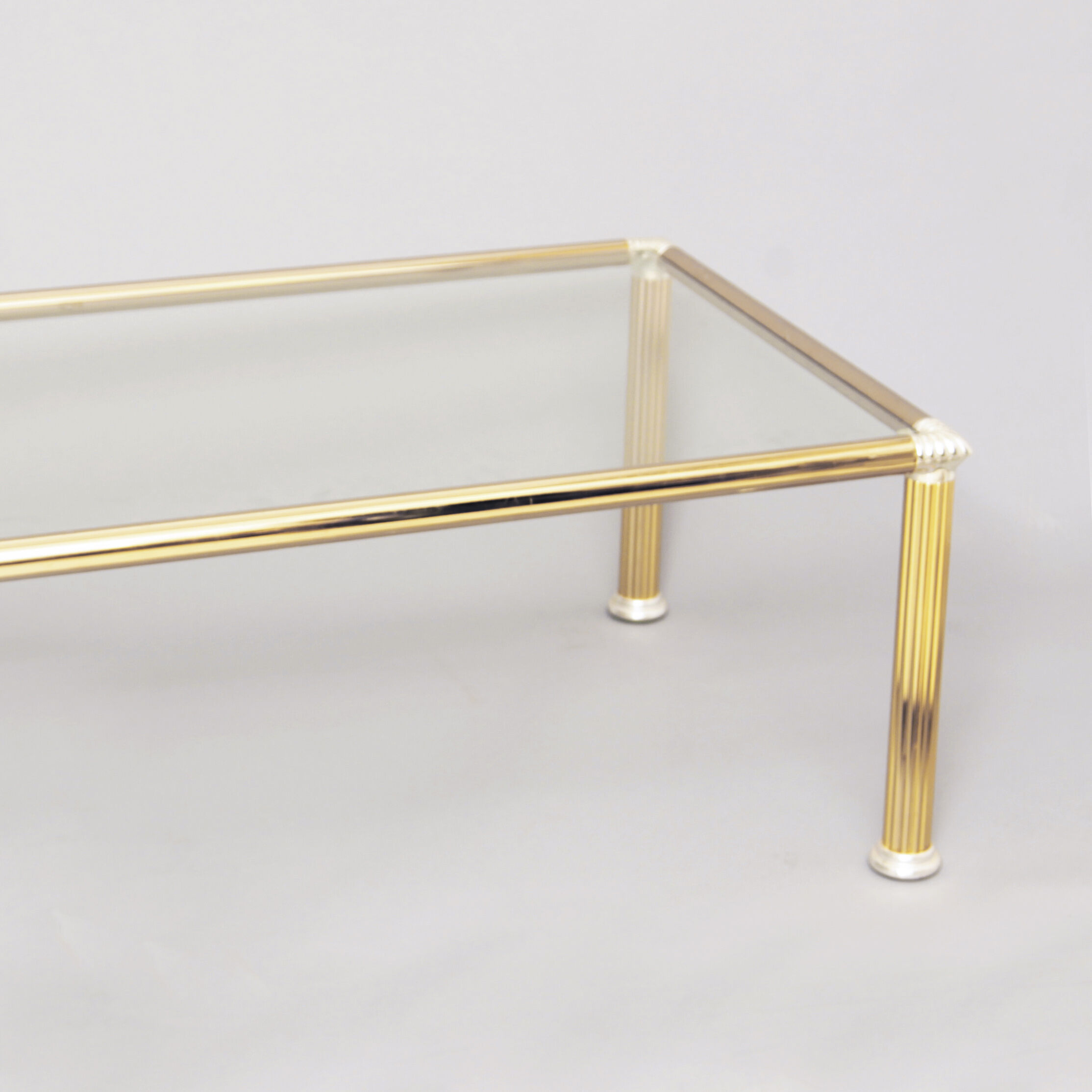 Chrome & brass column legs coffee table