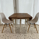 Extendable round table in raw and white wood
