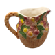 Vintage pitcher in cherry patterned dabbling