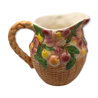 Vintage pitcher in cherry patterned dabbling