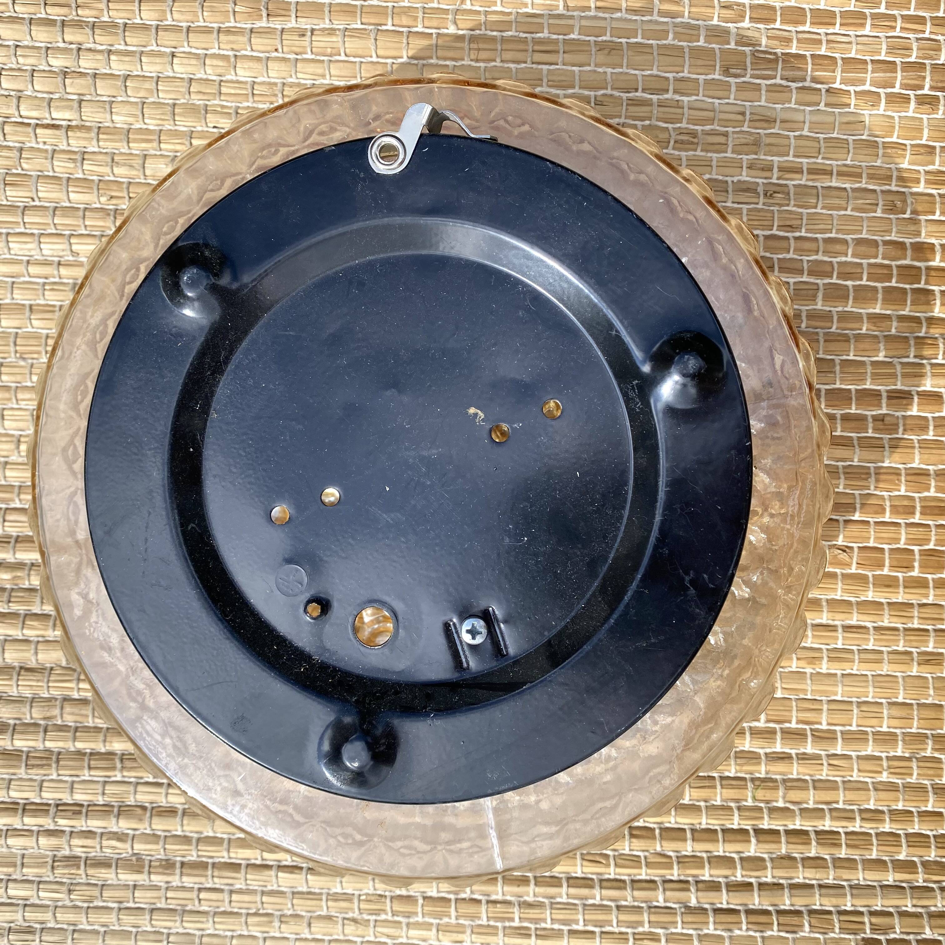 Vintage round ceiling light in amber glass