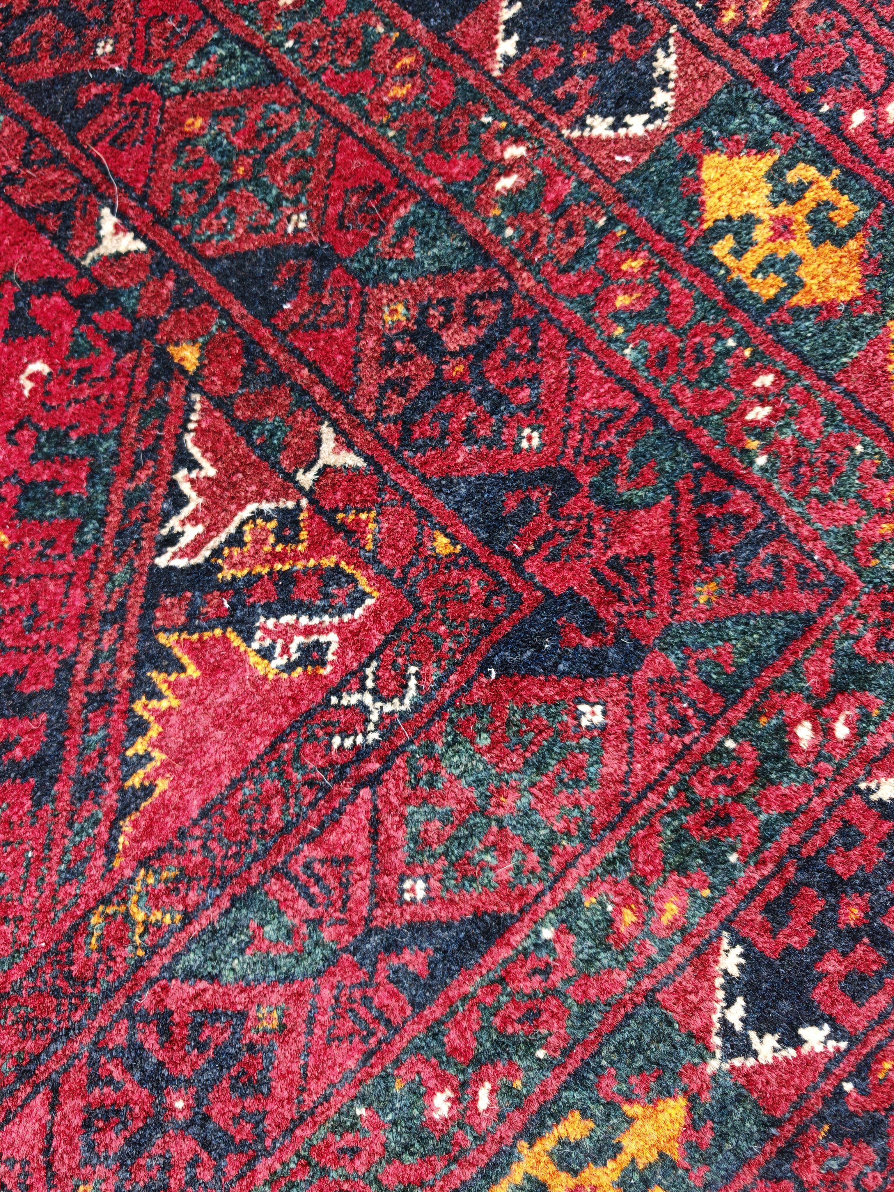Vintage hand-knotted Kunduz rug, natural dyes, 1940s.