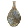 Shell bottle in molded glass