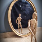 Golden oval mirror 34x46cm