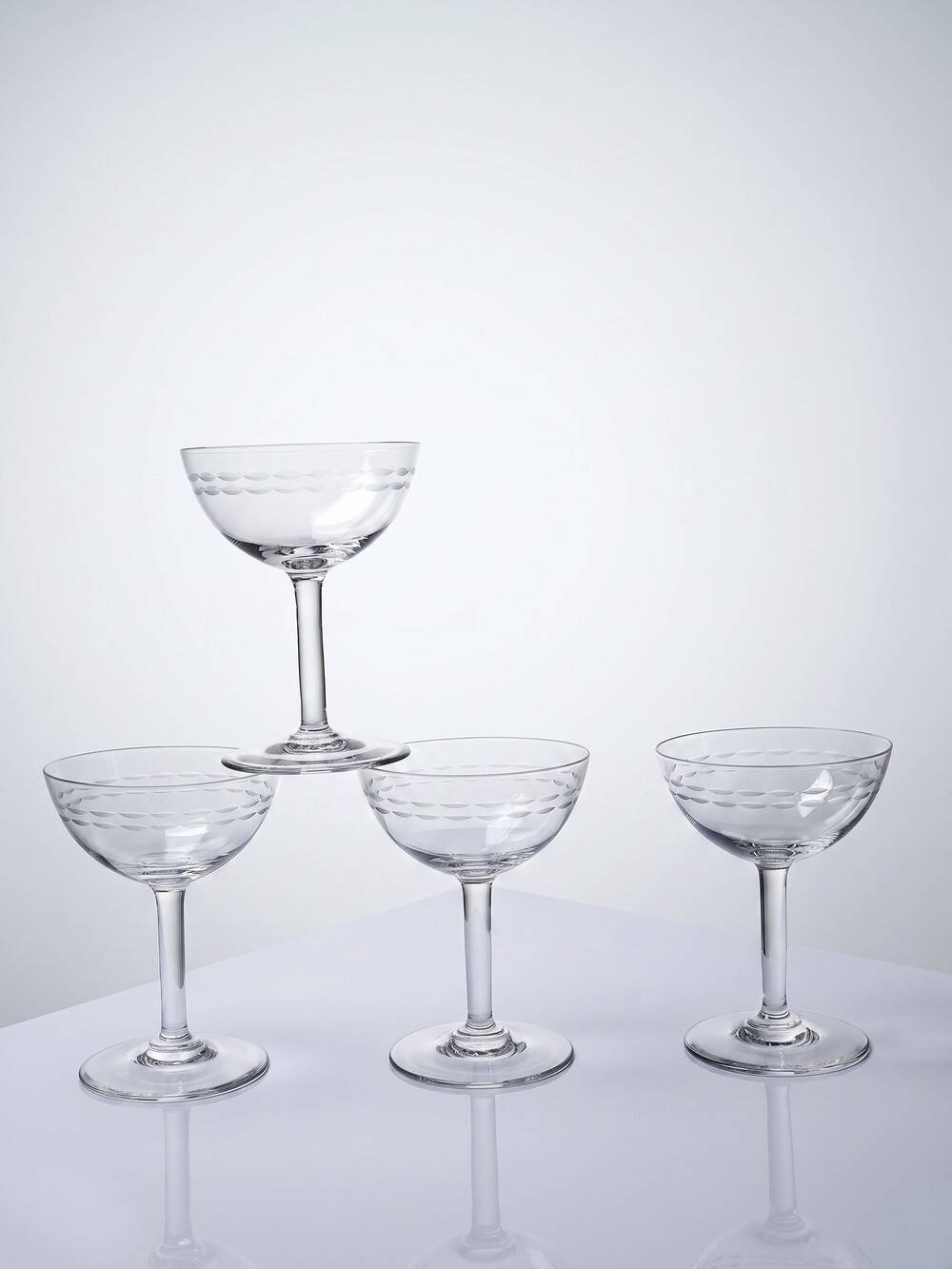 4 large engraved champagne glasses, Art Deco style from 1925-1940.